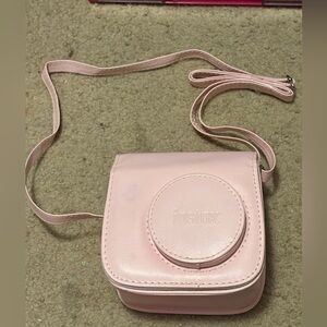 NWOT instax mini 7+ pink camera case with a long strap